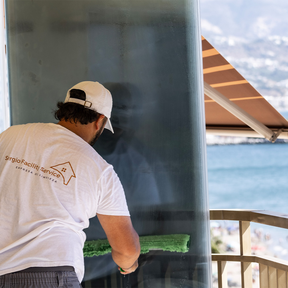 Professional window cleaning in Marbella by Sergio Facility Service at a luxury coastal property.